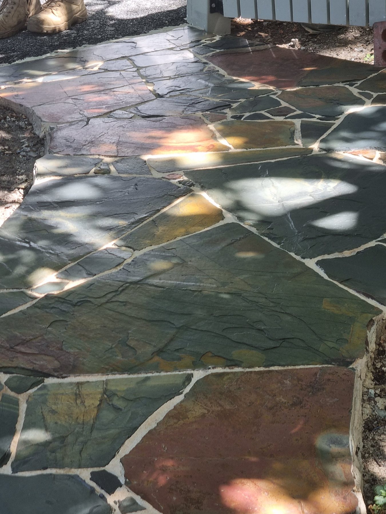 Close view of the multicoloured slate crazy paving